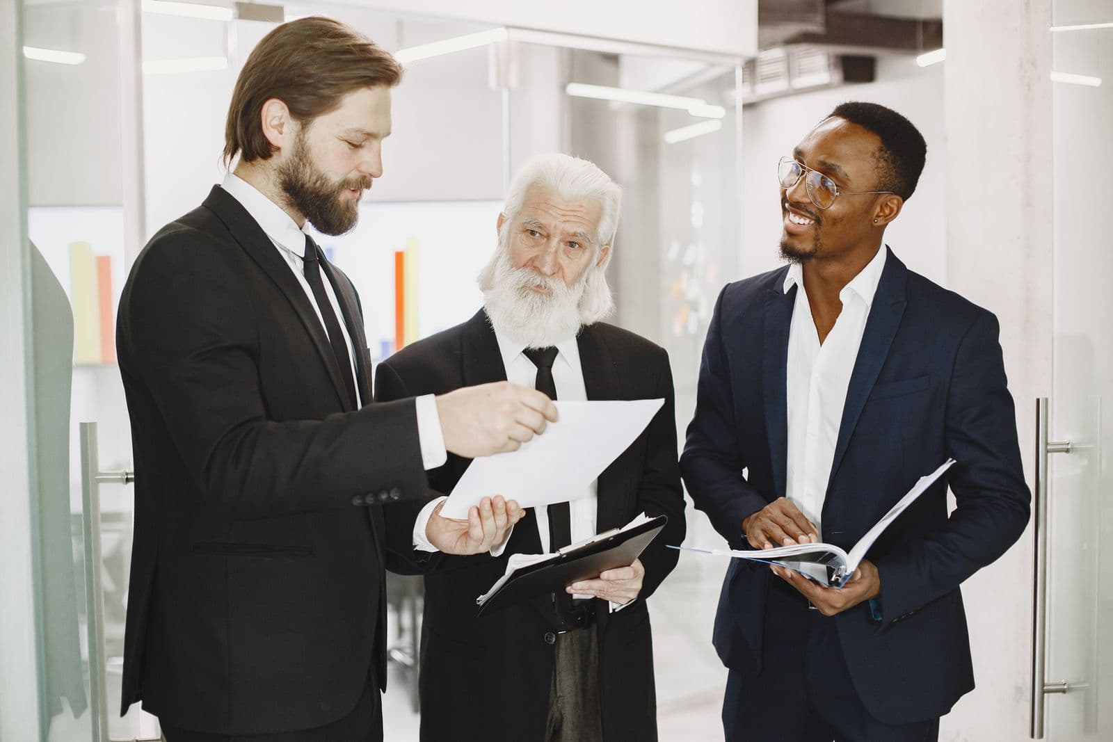 Business leaders reviewing documents in a boardroom